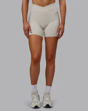 Sara Strike Ultra High-Rise Cross Over Waist 6" Short - Shale Beige Travel Fit Quick Absorption