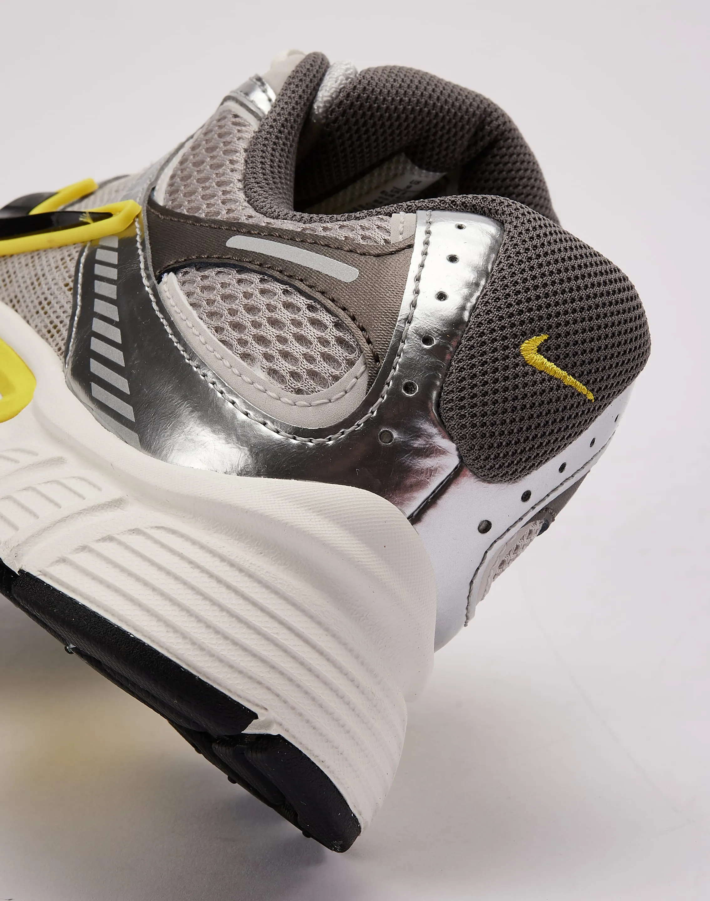 Variable Lacing running in a school yard shoes Nike V5 RNR