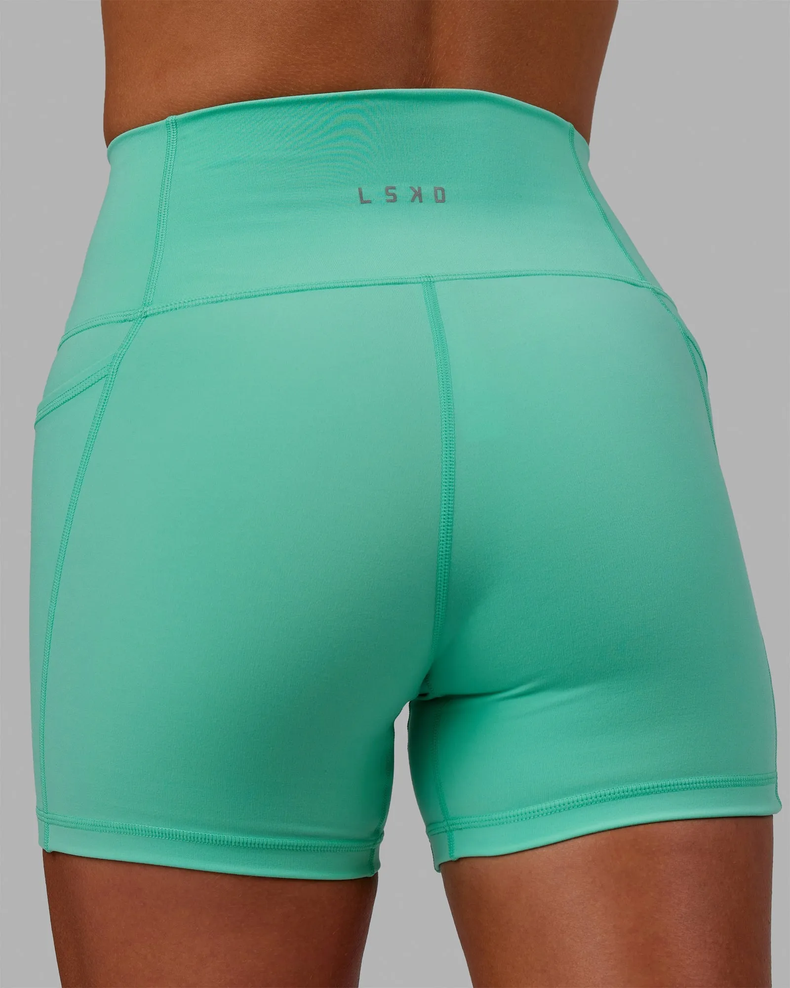 Running Gear Sports Wear Fusion Ultra High-Rise 4" Short Pockets - Cockatoo