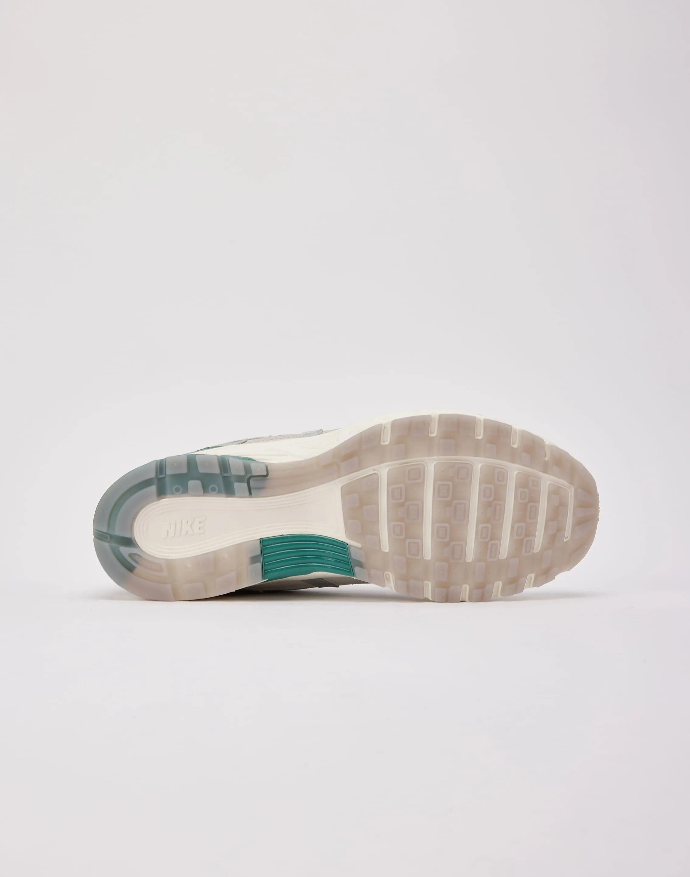 Nike P-6000 Premium Ventilated Airflow Design running in a strait area shoes