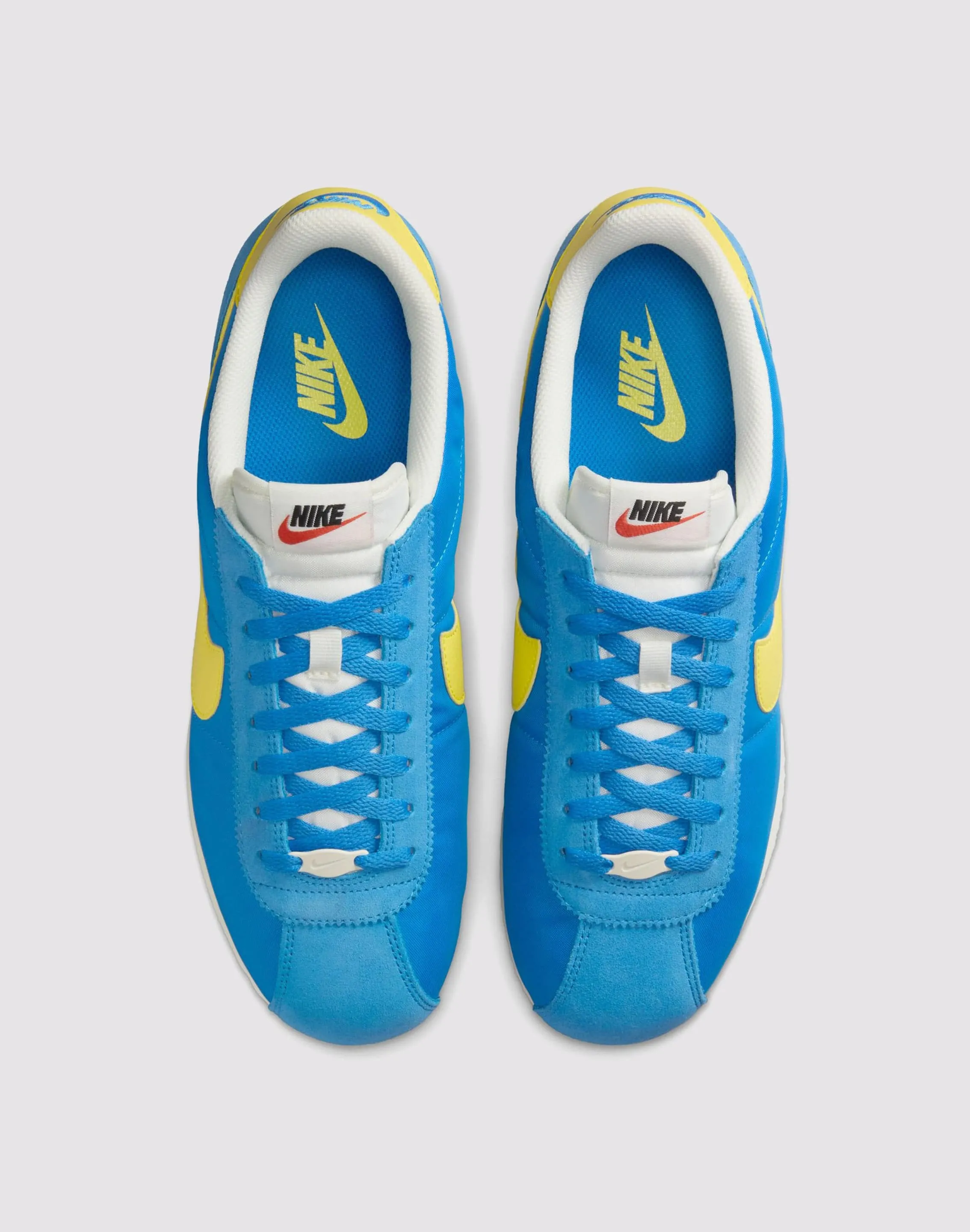 pre - molded - fit shoes running in a park shoes Nike Cortez