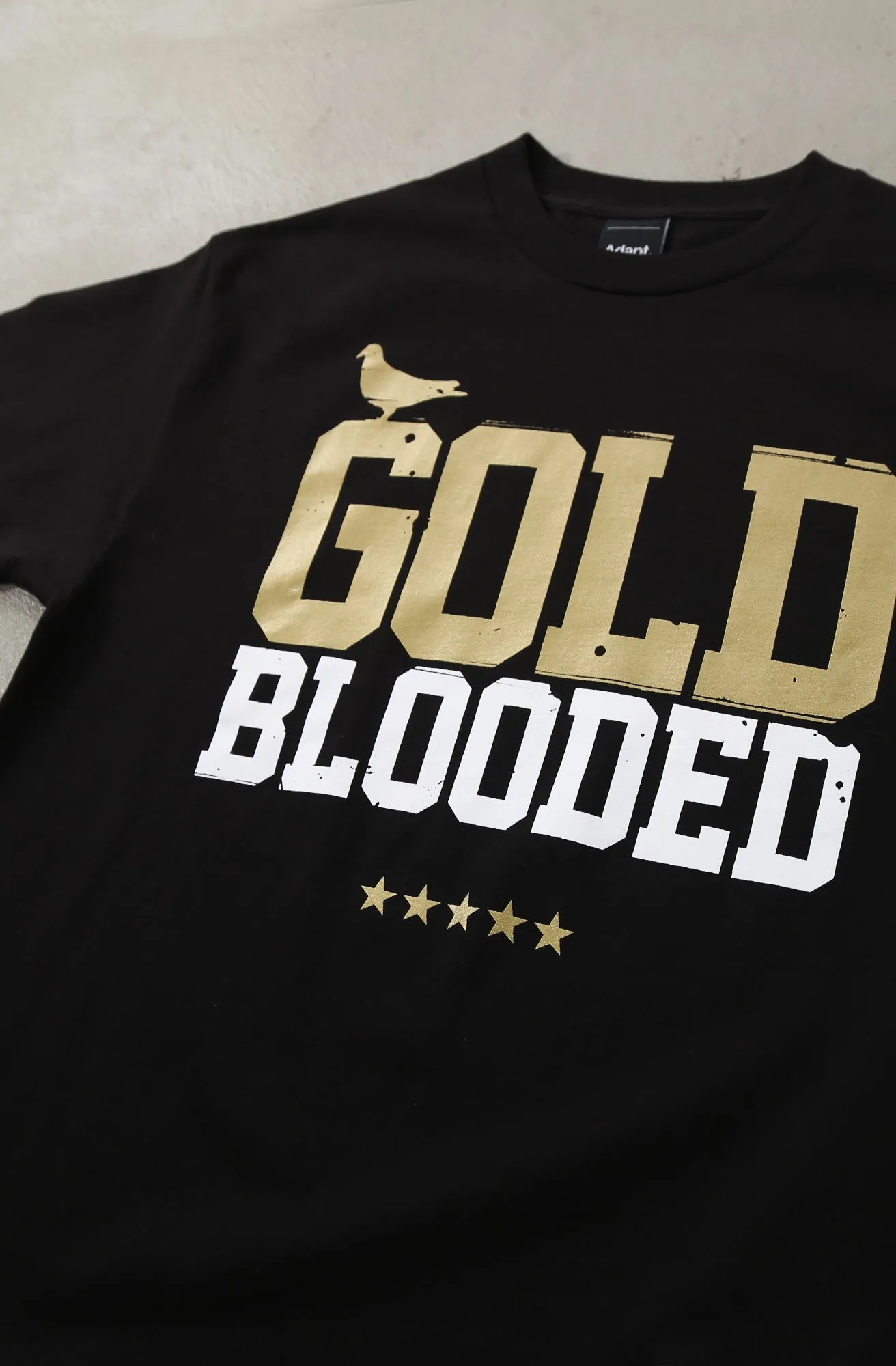 Easy to Style Flexible Ribbed Cuffs Gold Blooded (Men's Black/White/Gold Tee)