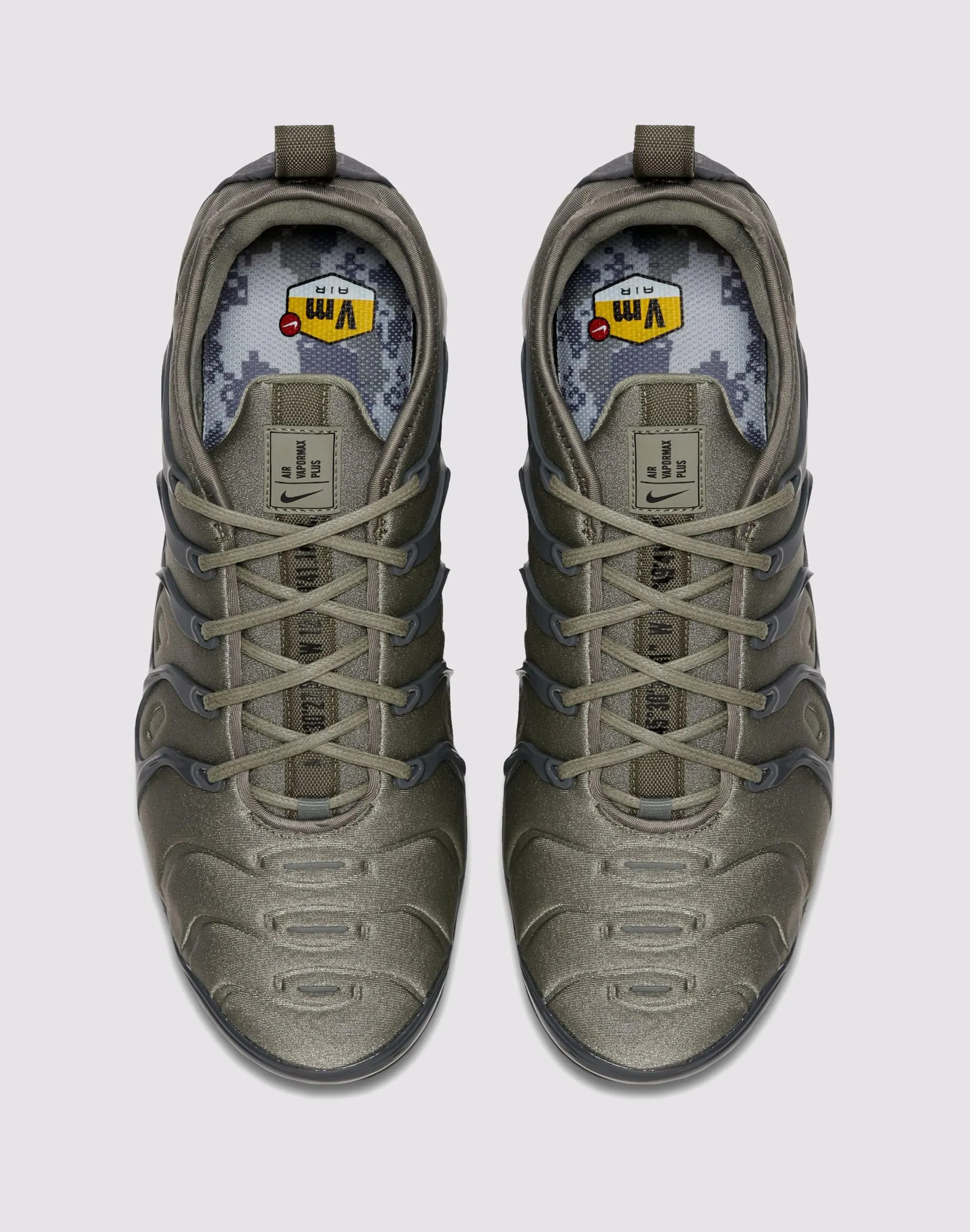 running in a bike lane area shoes Nike Air VaporMax Plus