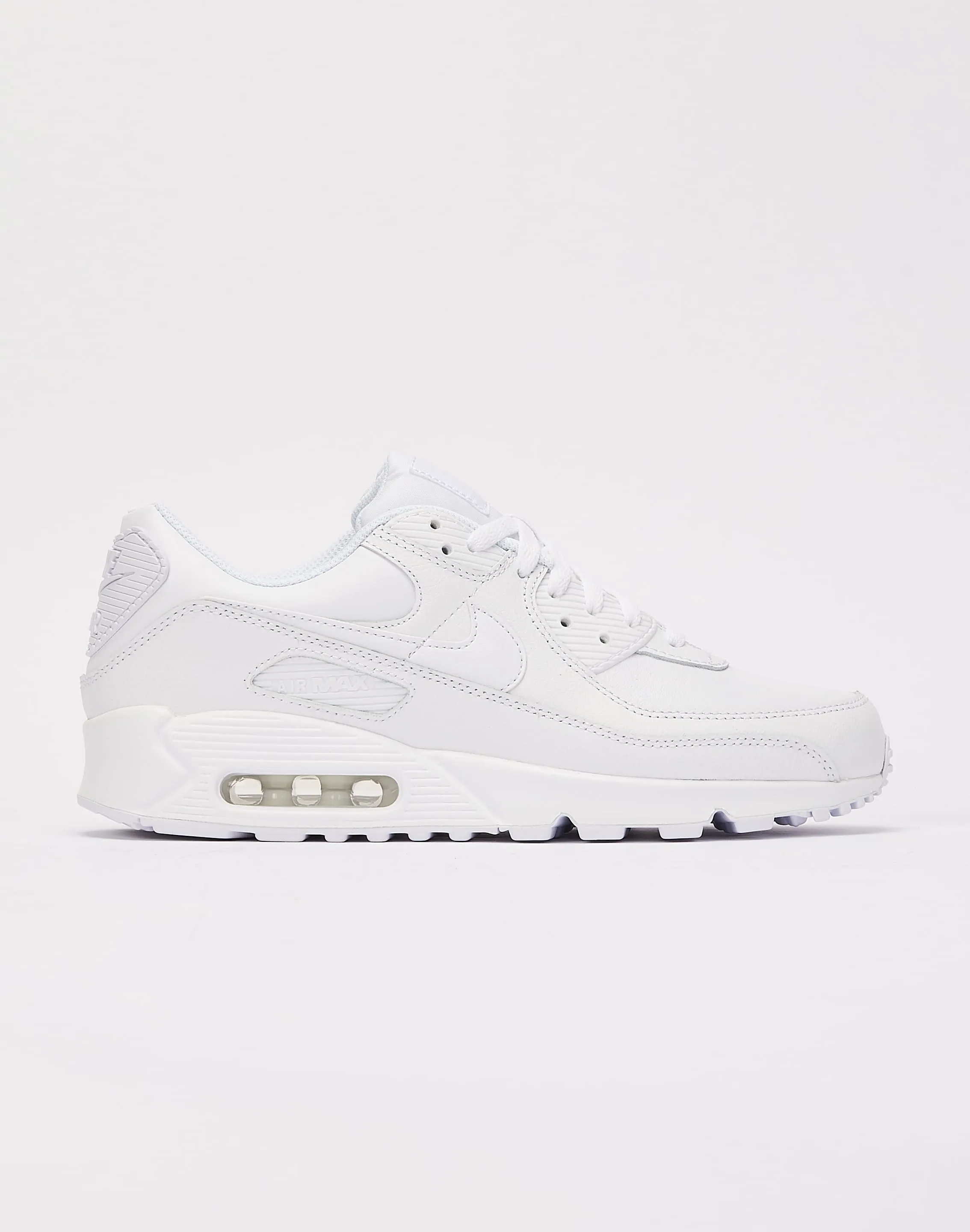 Nike Air Max 90 kids' running in stadium