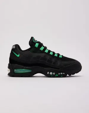 running in a ferry terminal area shoes Nike Air Max 95 OG