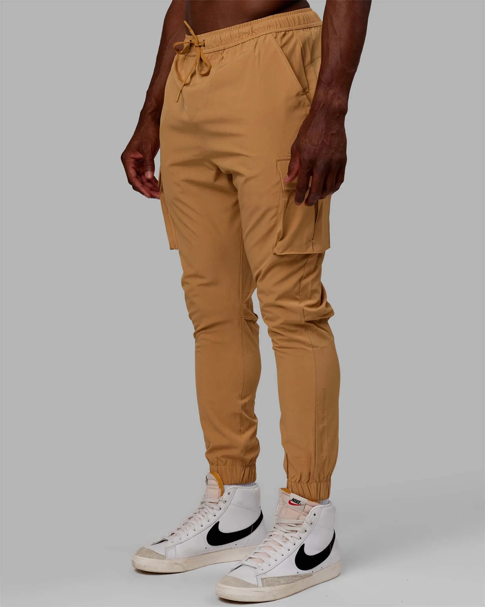 Durable Sole Thermal Regulating Material Energy Stretch Performance Cargo Jogger - Latte