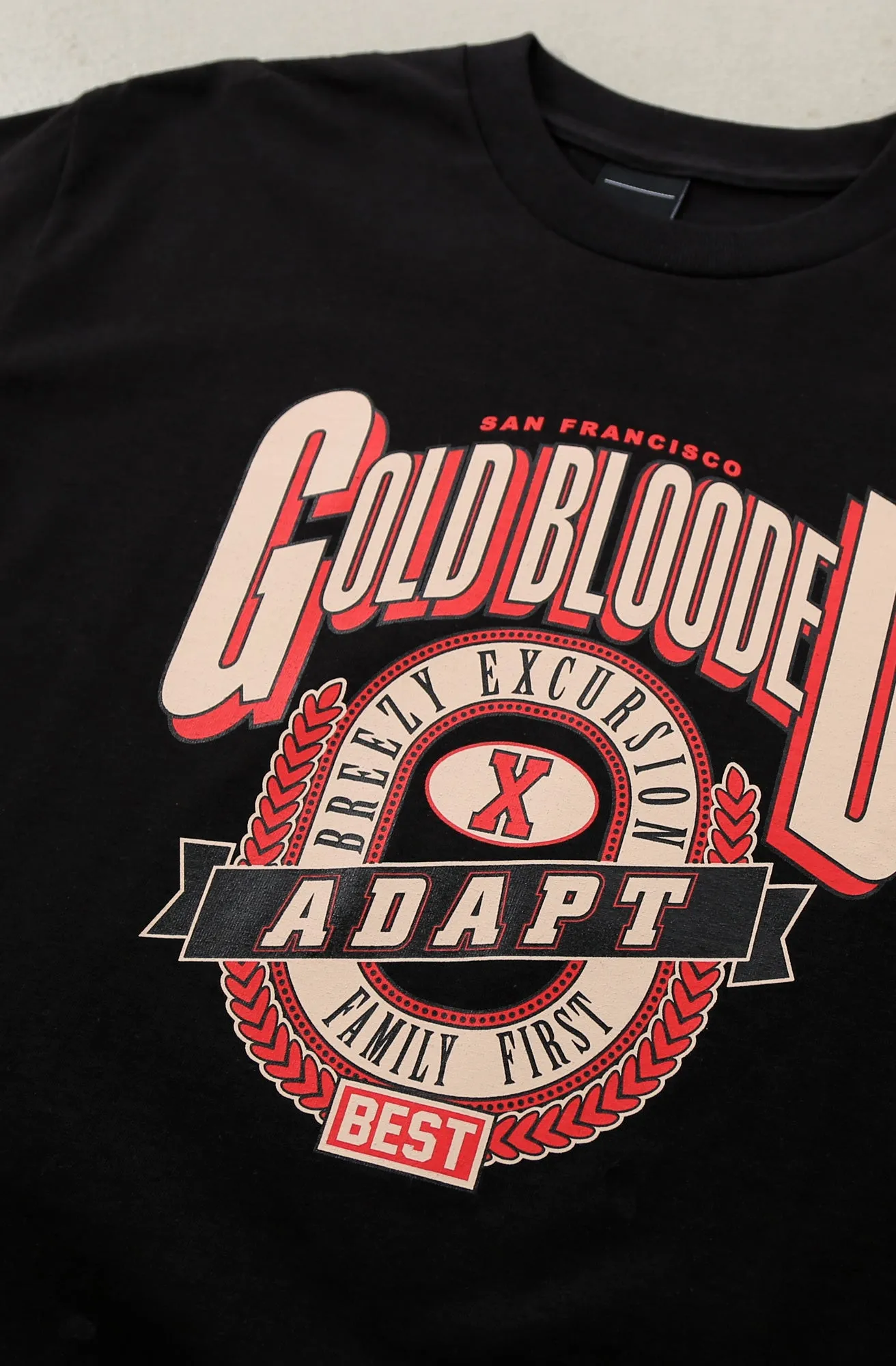 Breezy Excursion X Adapt :: Gold Blooded Breezy (Men's Black Tee) Perfect Layer Quick Release Hem