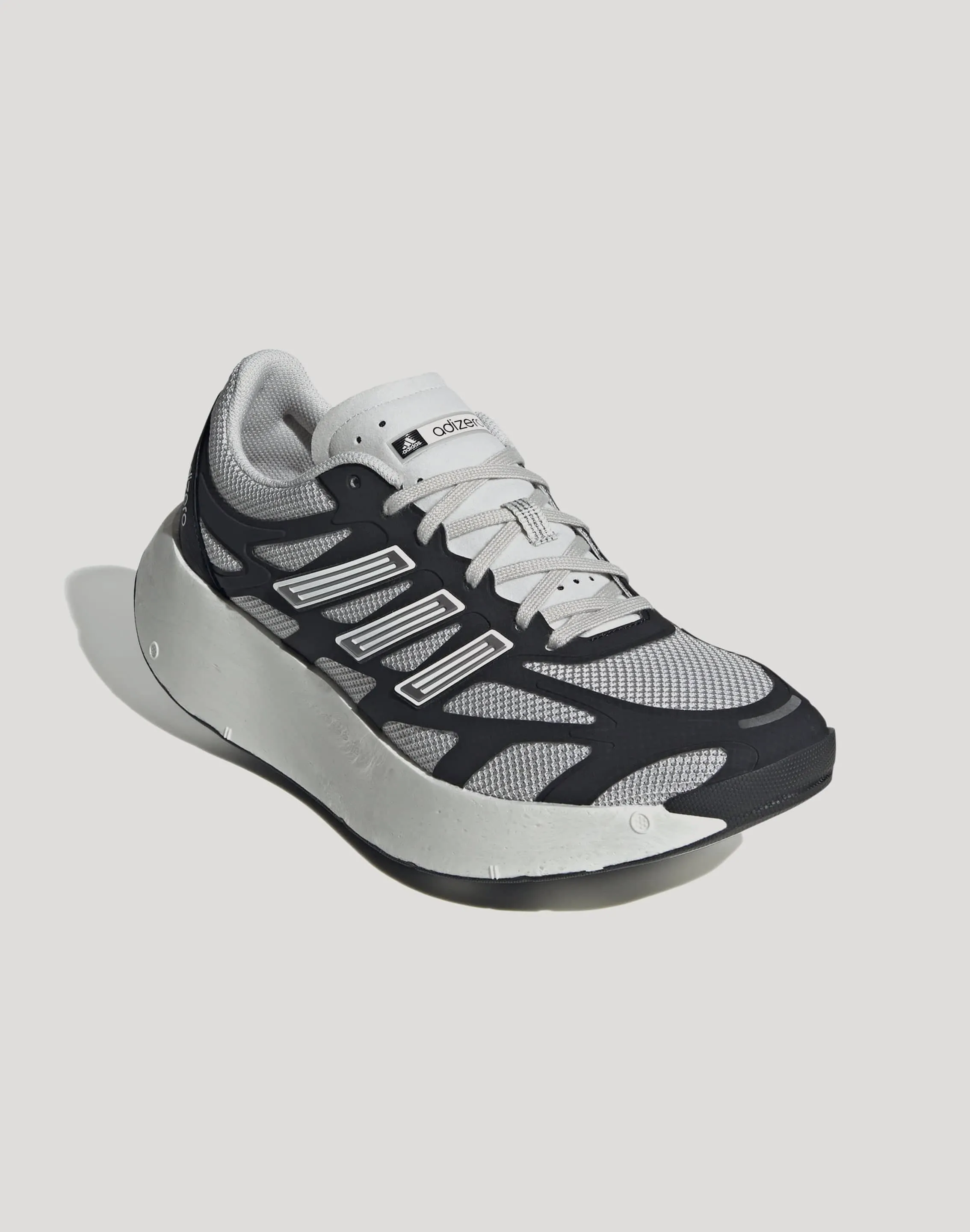 Adidas Adizero Aruku "Black/Grey One" Adult - runner running in a 10K shoes